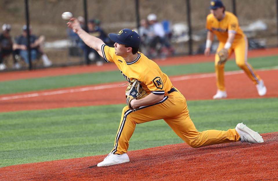 Moeller's Toby Hueber throws the ball during their win over St. Xavier Wednesday, March 30, 2022.