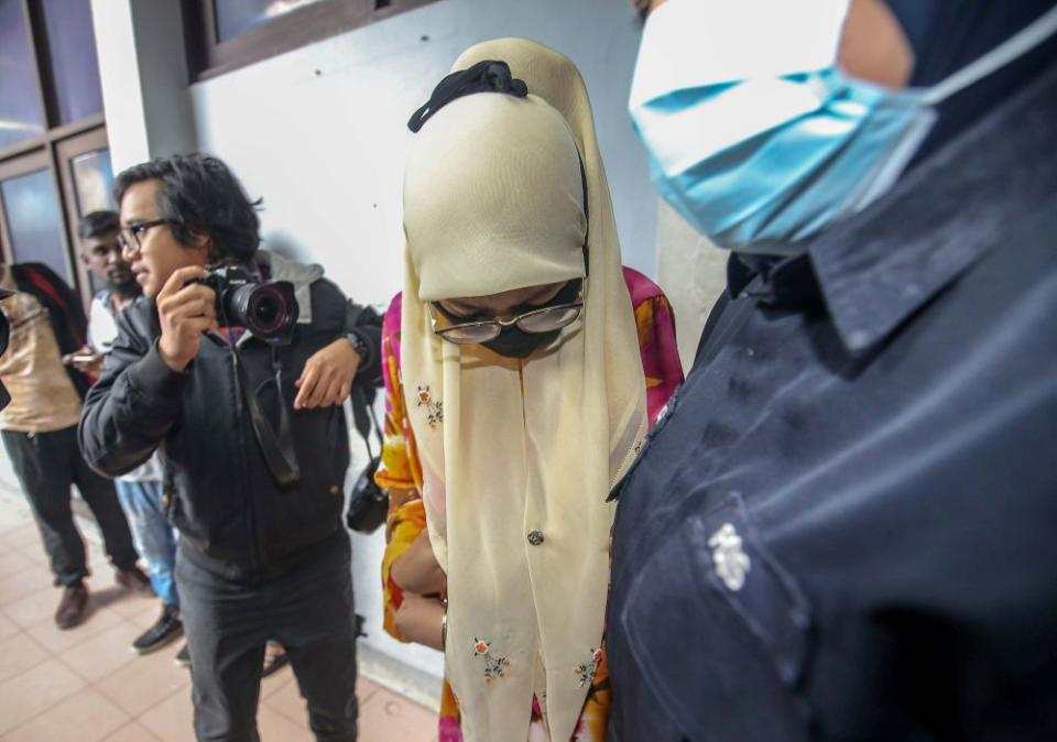 Sergeant (probation) Raja Nur Hasliza Raja Zainal Abidin, 25, arrives at the Ipoh Sessions Court July 13, 2020. — Picture by Farhan Najib