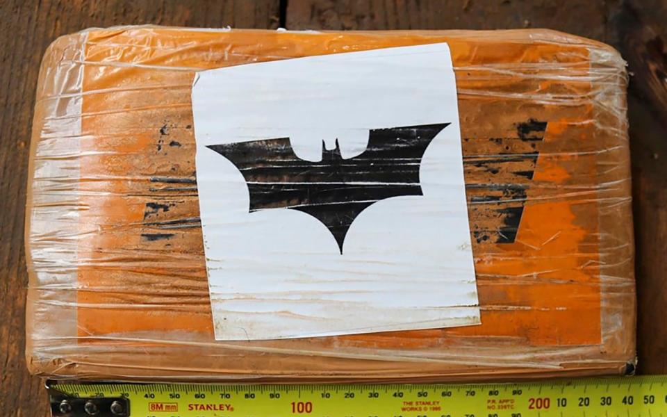 Some bales had a Batman symbol and cocaine inside was labelled with a four-leaf clover - AP