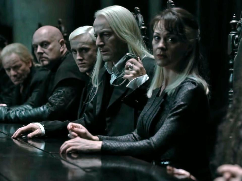 production still of the malfoy family in harry potter