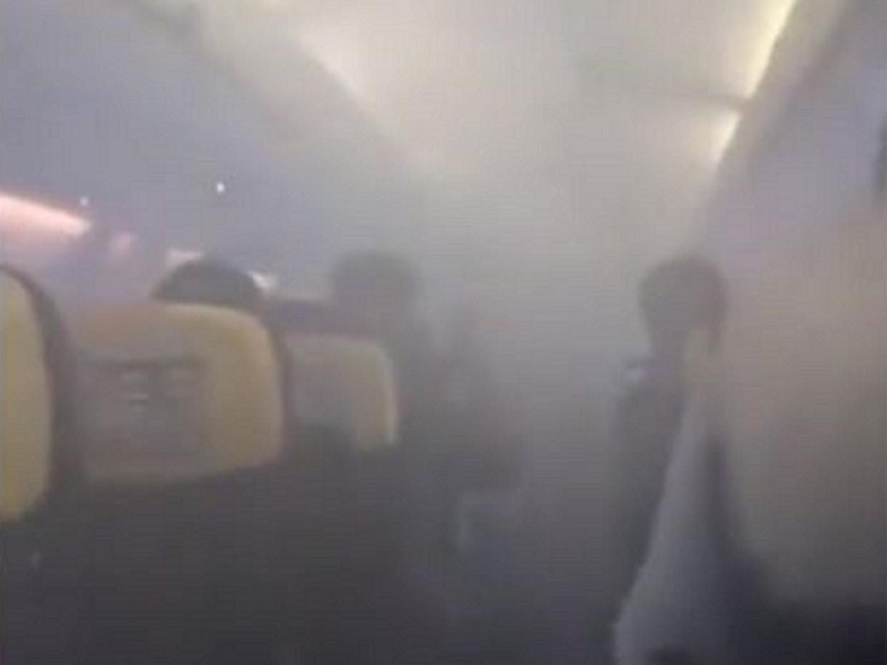 Still image from video of smoke filling the cabin of a Ryanair flight to London Stansted shortly after take-off from Bucharest, Romania, on 21 January, 2020: Adrian Bilanici