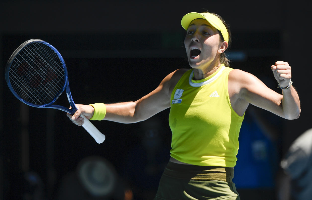 United States' Jessica Pegula celebrates after defeating Ukraine's Elina Svitolina in their fourth round match at the Australian Open tennis championship in Melbourne, Australia, Monday, Feb. 15, 2021.(AP Photo/Andy Brownbill)