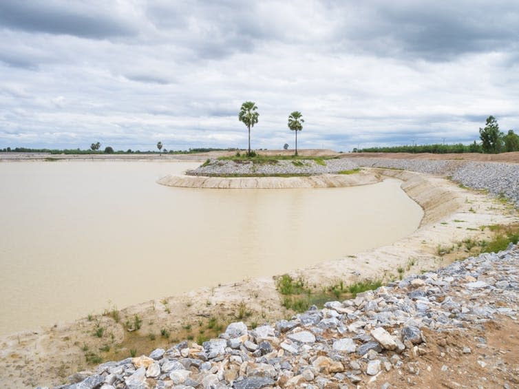 <span class="caption">An example of an earth bund.</span> <span class="attribution"><a class="link " href="https://www.shutterstock.com/image-photo/catchment-area-soil-rocks-137184761" rel="nofollow noopener" target="_blank" data-ylk="slk:Shutterstock;elm:context_link;itc:0;sec:content-canvas">Shutterstock</a></span>