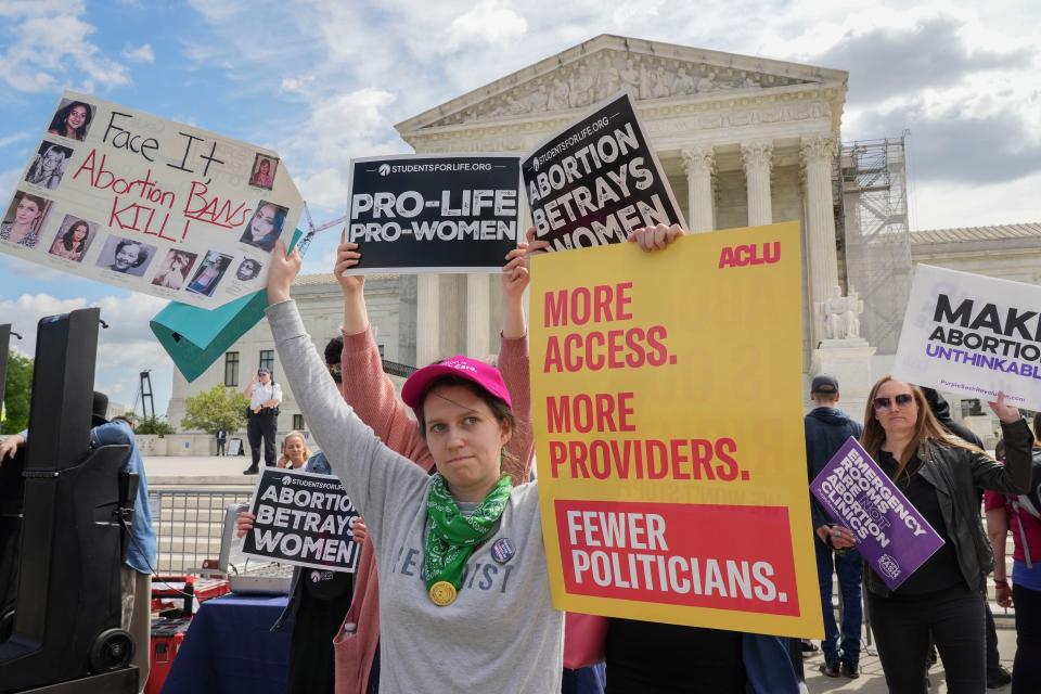 Opposing protesters rally outside the Supreme Court as the justices hear oral arguments in Idaho v. United States on April 24, 2024.