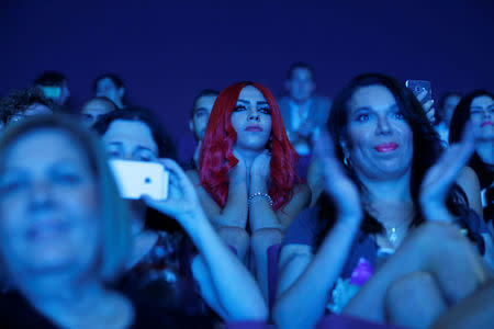 People in the crowd watch the first-ever Miss Trans Israel beauty pageant in Tel Aviv, Israel May 27, 2016. REUTERS/Amir Cohen