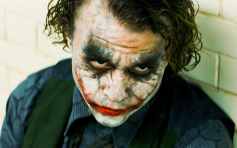 Red, red wine doesn't just go to your head - it can leave an unfortunate stain around your mouth that makes you look like The Joker, as played by the late Heath Ledger (pictured) - Credit: Warner Bros./Handout/Reuters