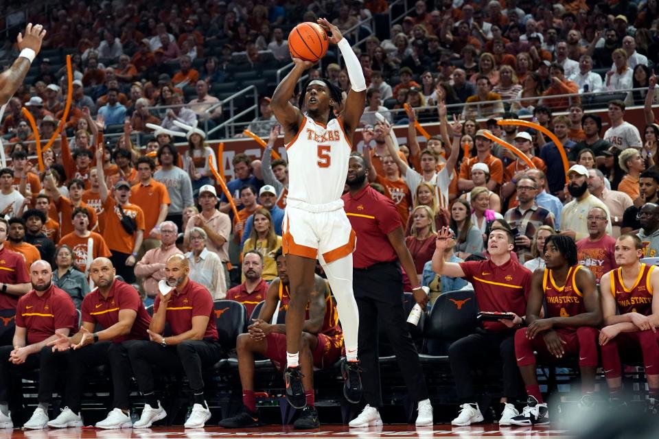 Texas guard Marcus Carr takes a shot against the Iowa State Cyclones earlier this year. Carr received a first-team All-Big 12 selection from the conference coaches after leading Texas in scoring (16.2 points per game), assists (129), steals (51) and minutes (33.2 minutes per game).