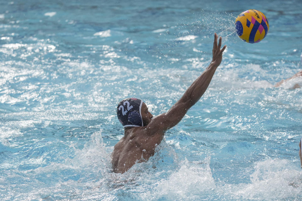 U.S. Olympic Water Polo Team attacker Max Irving trains for the Paris Olympics, at Mt. San Antonio College in Walnut, Calif., on Wednesday, Jan. 17, 2024. Irving's father, Michael Irving, is a Pac-12 college basketball referee. Max Irving is also the only Black man on the U.S. Olympic Water Polo Team and a prominent advocate for diversity in the sport. (AP Photo/Damian Dovarganes)