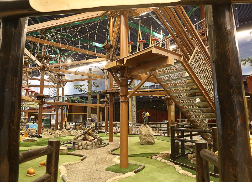 A miniature golf course runs underneath the high ropes course in the Adventure Park at the Great Wolf Lodge Maryland in Perryville, Md.