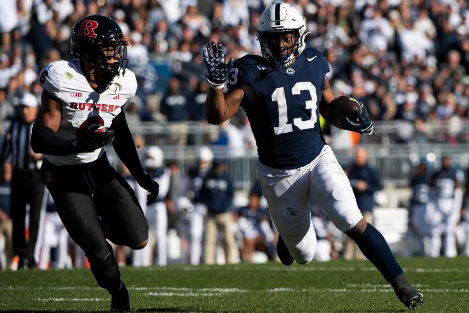 Penn State running back Kaytron Allen (13) finds running room during the second half of an NCAA football game against Rutgers Saturday, Nov. 18, 2023, in State College, Pa. The Nittany Lions won, 27-6.