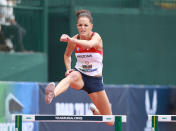 A fall in the NCAA Outdoor 400 hurdles semifinals cost Arizona junior Georganne Moline a shot at the national title. No such bad luck befell Moline at the U.S. Olympic Trials, where she ran a personal-best time of 54.33 seconds to finish second and make the U.S. team. (Photo by Andy Lyons/Getty Images)