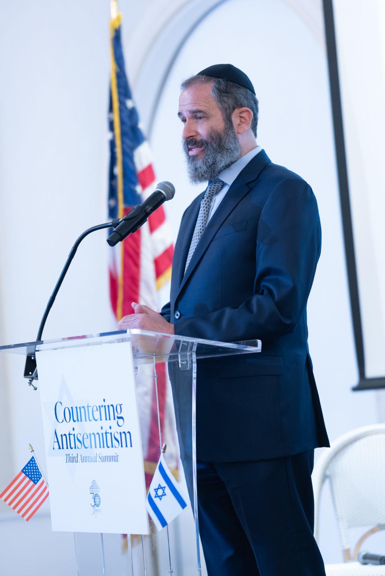 Palm Beach Synagogue Rabbi Moshe Scheiner stressed the importance of combatting antisemitism in every generation during his opening remarks.