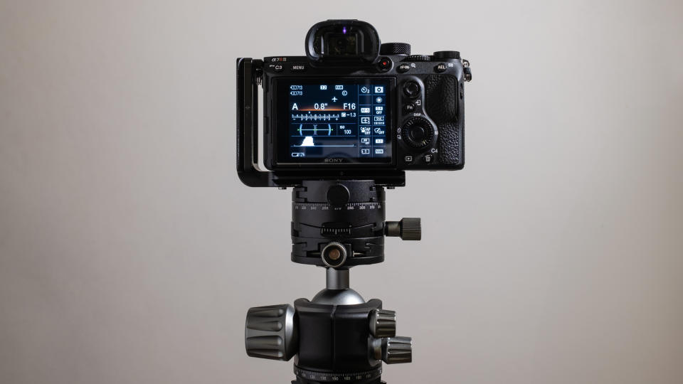 Sony A7 RIII attached to a Leofoto LH-40GR Ball Head in front of a white wall