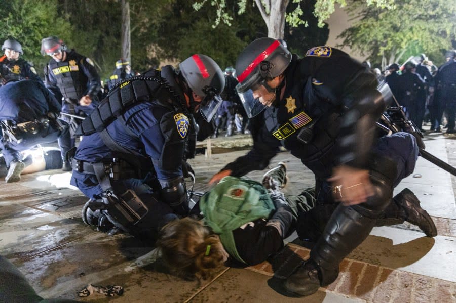 LOS ANGELES, CALIFORNIA – MAY 2: US Police arrests a Pro-Palestinian demonstrator as the people protest at UCLA, in Los Angeles, California, USA on May 2, 2024. (Photo by Grace Yoon/Anadolu via Getty Images)