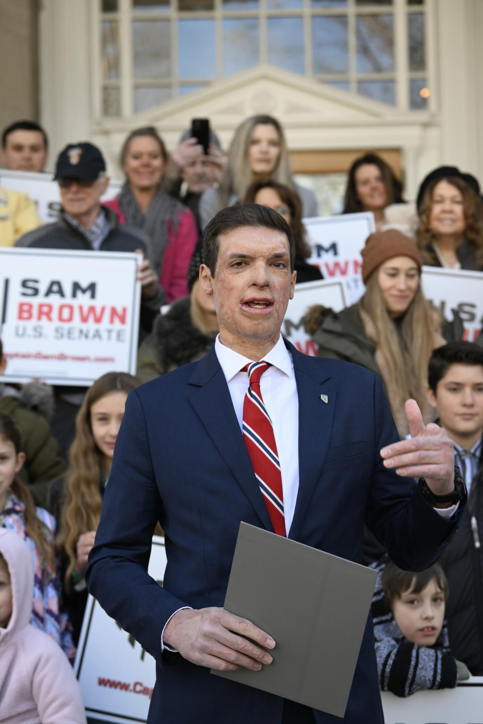 Republican U.S. Senatorial candidate Sam Brown speaks after filing his paperwork to run for the Senate, Thursday, March 14, 2024, at the State Capitol in Carson City, Nev. Brown is seeking to replace incumbent U.S. Sen. Jacky Rosen. (AP Photo/Andy Barron)