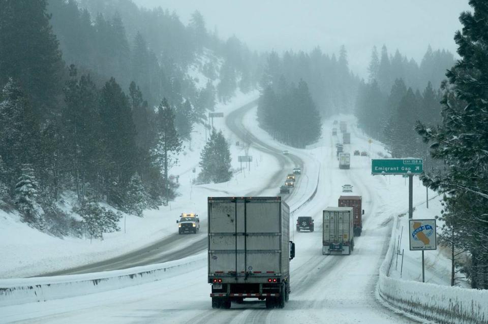 Vehicles drive slowly during chain control along I-80 east on Wednesday, Jan. 27, 2021 near Emigrant Gap.