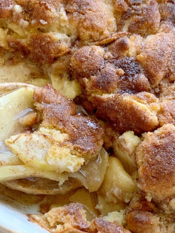 <p>Together as a Family</p><p>Apple cobbler with a sweet snickerdoodle cookie topping! Warm granny smith apples with cinnamon and sugar, topped with an easy snickerdoodle cookie topping. </p><p><strong>Get the recipe: <em><a href="https://togetherasfamily.com/snickerdoodle-apple-cobbler/" rel="nofollow noopener" target="_blank" data-ylk="slk:Snickerdoodle Apple Cobbler;elm:context_link;itc:0;sec:content-canvas" class="link ">Snickerdoodle Apple Cobbler</a></em></strong></p>