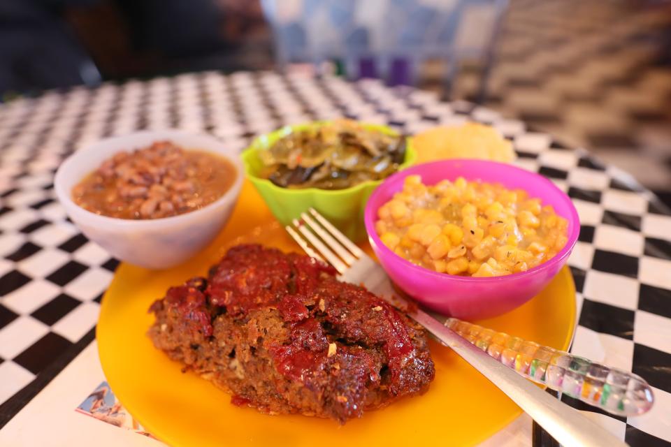 Meatloaf with pinto beans, corn and greens at Alcenia's, a soul-food restaurant in downtown Memphis on Friday, Jan. 25, 2019. 