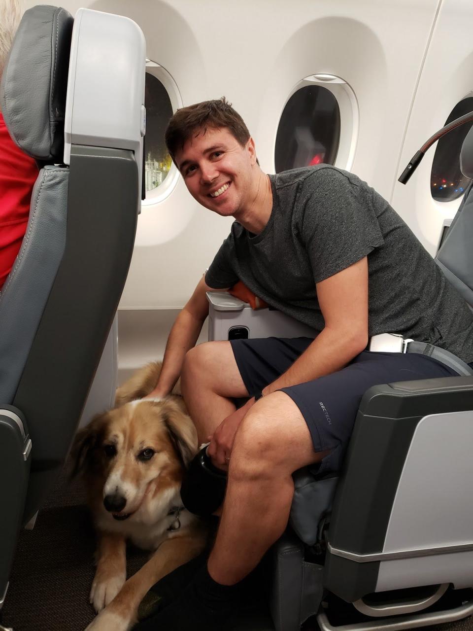 Ryan Huling and Penny on their flight to Vietnam in September 2019.