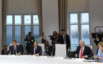 From the left, French President Emmanuel Macron, Egyptian President and Chairman of the African Union Abdel Fattah al-Sissi, Chile's President Sebastian Pinera and German Chancellor Angela Merkel attend a work session focused on climate in Biarritz, southwestern France, Monday Aug. 26, 2019, on the third day of the annual G7 Summit. The empty seat at third right was the place reserved for President Donald Trump, who according to Macron had skipped Monday’s working session on the climate. At the same time Macron said that Trump supported an initiative by G-7 countries for an immediate $20 million fund to help Amazon countries fight wildfires and launch a long-term global initiative to protect the rainforest. (Ludovic Marin, Pool via AP)