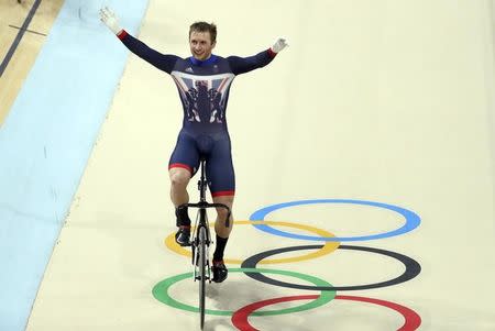 2016 Rio Olympics - Cycling Track - Final - Men's Keirin Final Race for 1st-6th Places - Rio Olympic Velodrome - Rio de Janeiro, Brazil - 16/08/2016. Jason Kenny (GBR) of Britain celebrates winning the gold medal. REUTERS/Paul Hanna
