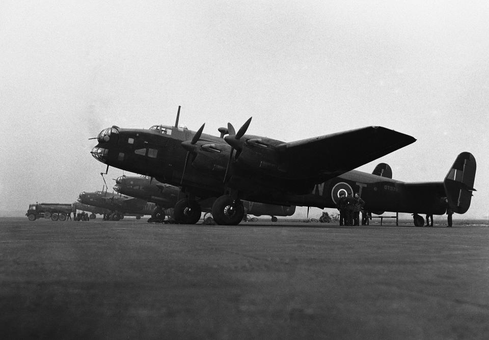 FILE - Giant Halifax bombers drawn up at an Royal Air Force Bomber Command station, somewhere in England on March 3, 1943, after they have been serviced and are ready to start out on another bombing raid over enemy territory. (AP Photo, File)