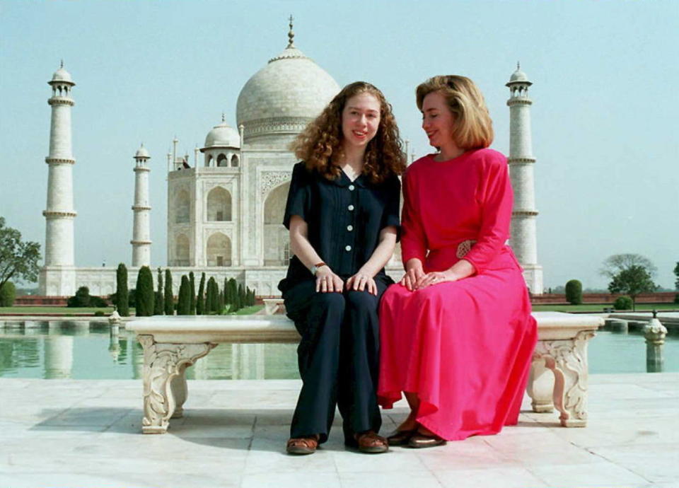 Hilary and Chelsea stopped by during the then-First Lady's 12-day trip to South Asia.  (DOUGLAS E. CURRAN/AFP/Getty Images)