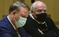 Michael Skakel, right, appears for his hearing at Stamford Superior Court, with his attorney Stephan Seeger, Friday, Oct. 30, 2020, in Stamford, Conn. A Connecticut prosecutor says Kennedy cousin Michael Skakel will not face a second trial in the 1975 murder of teenager Martha Moxley in Greenwich. (Erik Trautmann/Hearst Connecticut Media via AP, Pool)