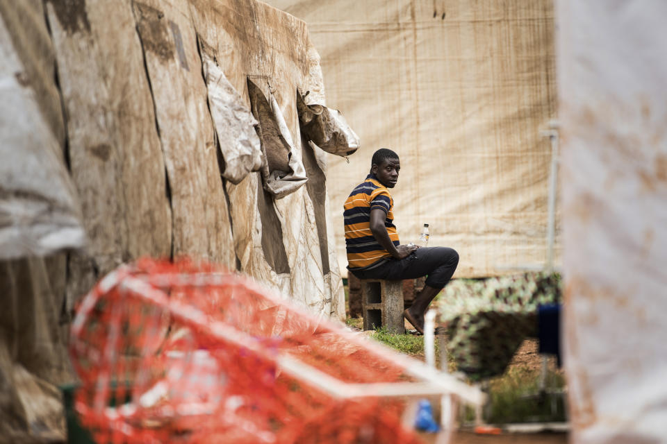 A cholera patient sits outside an isolation ward at the Bwaila Hospital in Lilongwe central Malawi Wednesday, Jan. 11, 2023.Malawi’s health minister says the country’s worst cholera outbreak in two decades has killed 750 people so far. The southern African country of 20 million people first reported the outbreak in March last year. (AP Photo/Thoko Chikondi)