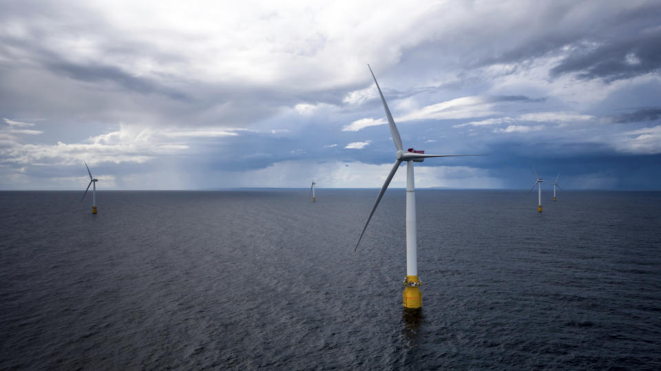 Hywind Scotland, the world's first commercial wind farm using floating wind turbines, is visible off the coast of Scotland in August 2017. Tuesday, Dec. 6, 2022, marks the first-ever U.S. auction for leases to develop commercial-scale floating wind farms in the deep waters off the West Coast. (Woldcam/Equinor via AP)