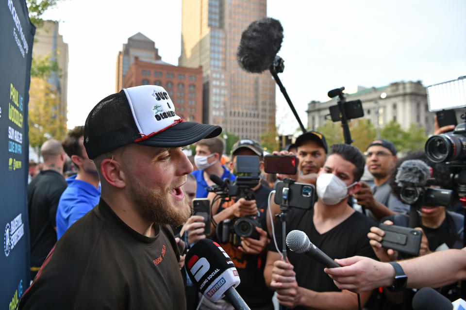 CLEVELAND, OHIO - AUGUST 25: Jake Paul talks to the press after a media work out at Cleveland Public Square ahead of his August 29 fight with Tyron Woodley on August 25, 2021 in Cleveland, Ohio. (Photo by Jason Miller/Getty Images)