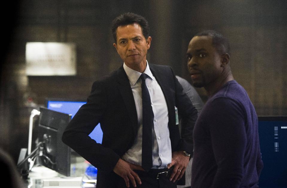This image released by Fox shows Benjamin Bratt, left, and Gbenga Akinnagbe in a scene from "24: Live Another Day," premiering Monday, May 5 at 8 p.m. EDT on Fox. (AP Photo/Fox, Christopher Raphael)