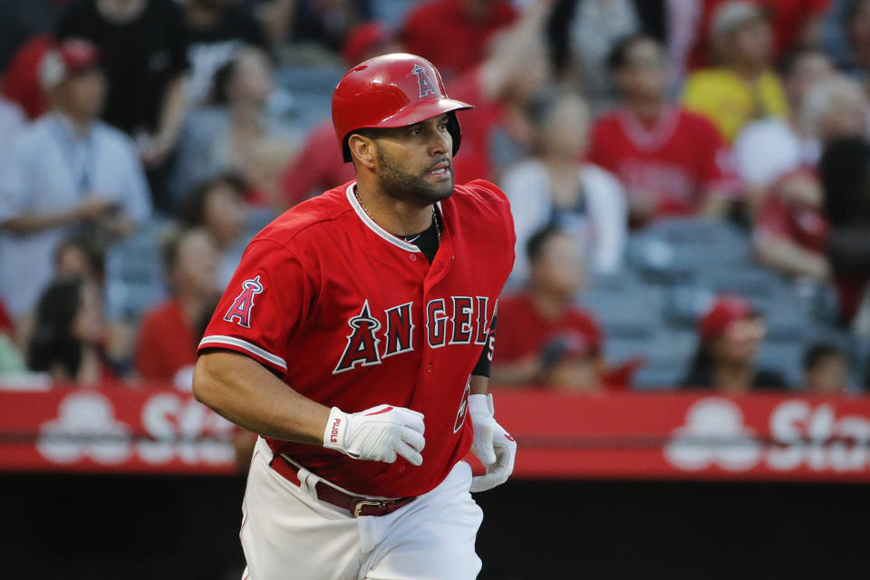 Albert Pujols is reportedly expected to miss the rest of the season after having surgery on his left knee. (AP)