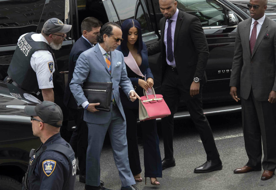 Grammy-winning rapper Cardi B arrives for a hearing at Queens County Criminal Court, Tuesday, June 25, 2019, in New York. (AP Photo/Mary Altaffer)