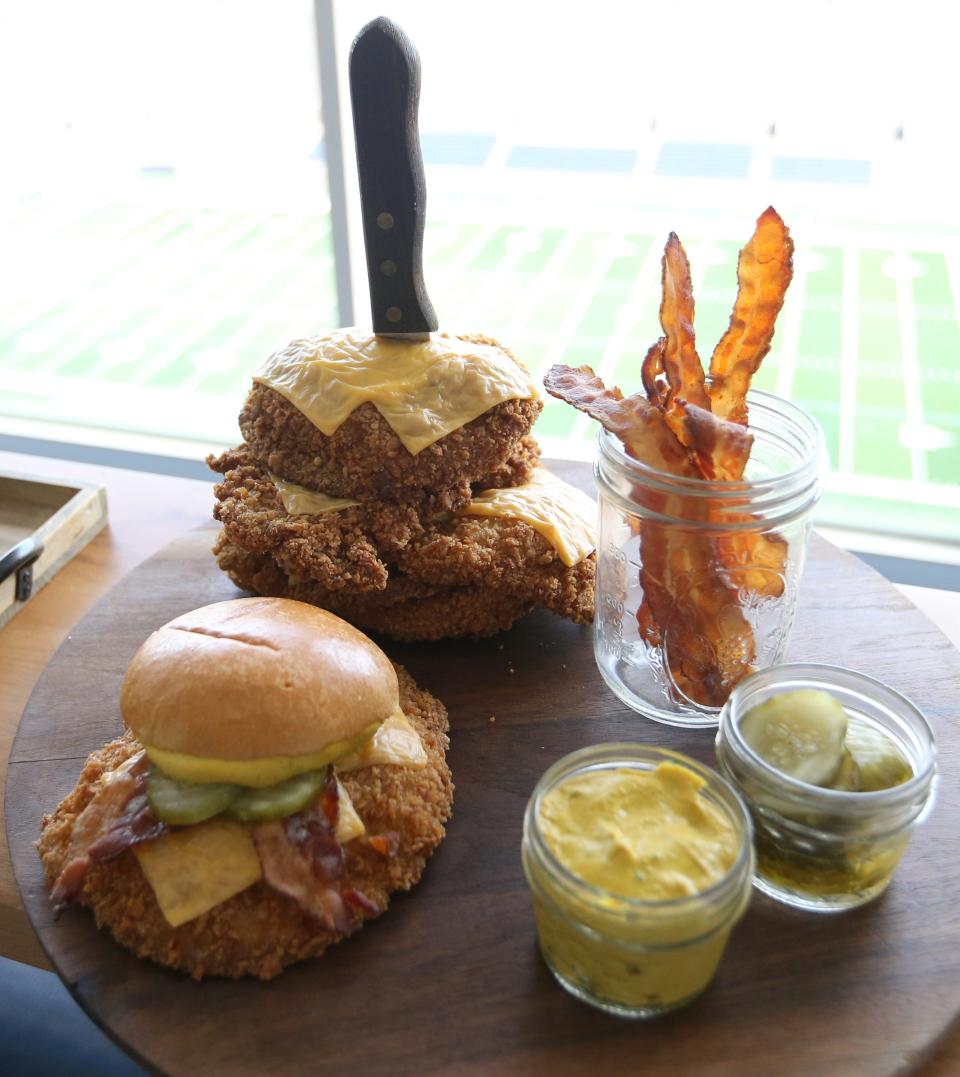 A Notre Dame football fan favorite, this Midwest-inspired pork tenderloin sandwich is hand-breaded, dressed in jalapeño yellow mustard with sweet and spicy house pickles and American cheese with smoked bacon on a seeded bun. Some new food items also will join all-time favorites for fans this year at Notre Dame Stadium.