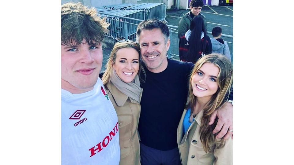 Gabby and Kenny Logan share a sweet moment with their children Reuben and Lois