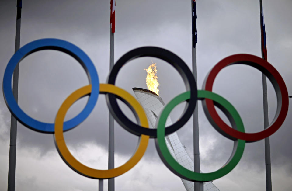 The Olympic flame is lit during a test in the Olympic Park for the upcoming 2014 Winter Olympics, Friday, Jan. 31, 2014, in Sochi, Russia. (AP Photo/David Goldman)