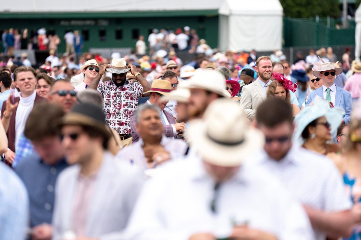 Crowds gather in the infield at Churchill Downs during the Kentucky Derby on Saturday, May 6, 2023, in Louisville, Ky.