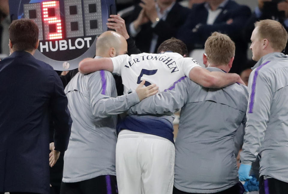 Tottenham's Jan Vertonghen walks off the pitch with a head injury during the Champions League semifinal first leg soccer match between Tottenham Hotspur and Ajax at the Tottenham Hotspur stadium in London, Tuesday, April 30, 2019. (AP Photo/Frank Augstein)