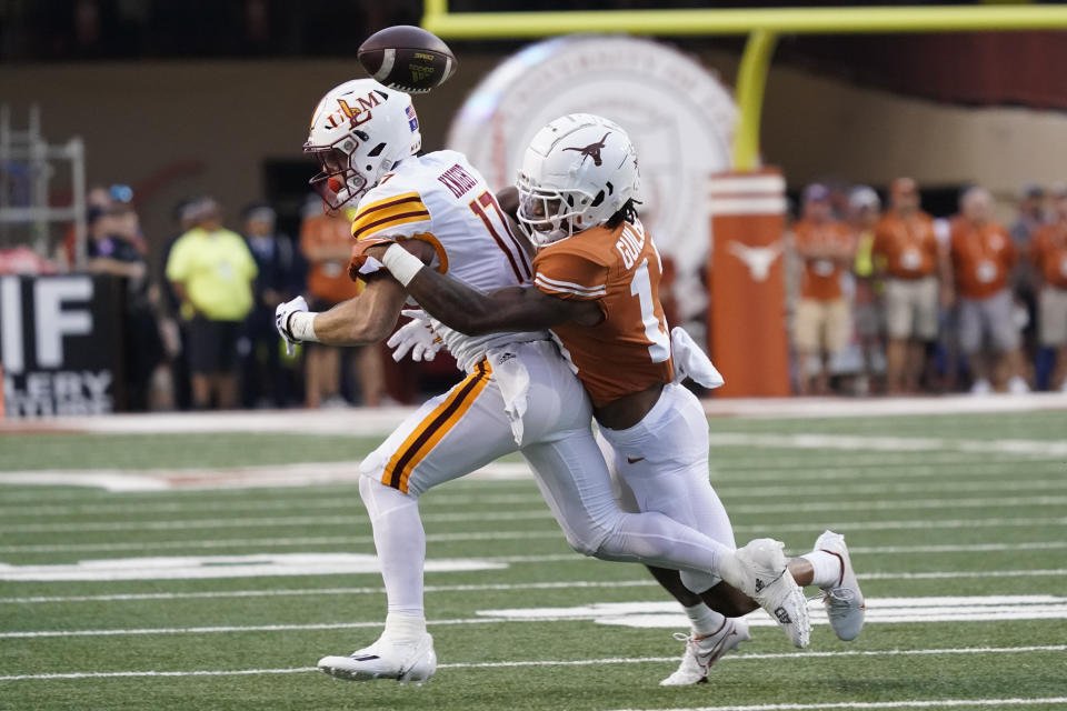 Sep 3, 2022; Austin, Texas, USA; Texas Longhorns defensive back Jaylon Guilbeau (13) forces the ball loose while tackling Louisiana Monroe Warhawks wide receiver Boogie Knight (17) in the first half at Darrell K Royal-Texas Memorial Stadium. Mandatory Credit: Scott Wachter-USA TODAY Sports