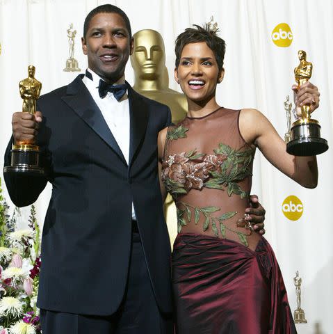 <p>Frederick M. Brown/Getty</p> Halle Berry and Denzel Washington