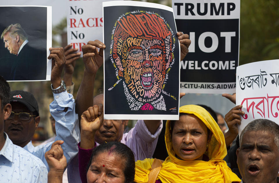 Indian activists shout slogans against the visit of U.S. President Donald Trump, in Gauhati, India, Monday, Feb. 24, 2020. Indian Prime Minister Narendra Modi’s Hindu nationalist government is pulling out all the stops, at an expense of more than $14 million, to woo the president and first lady Melania Trump. But experts have said that very little of substance will be achieved for either side beyond the pageantry and symbolism. (AP Photo/Anupam Nath)