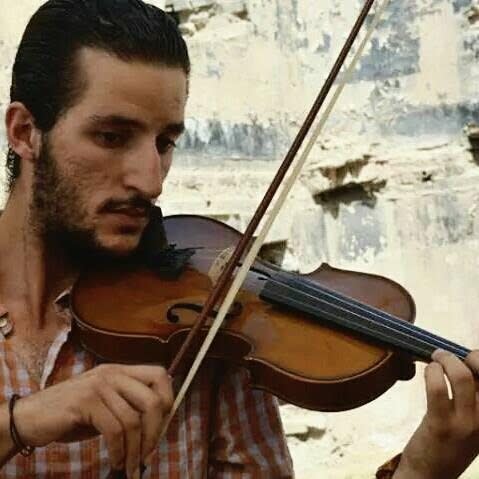 Ameen Mokdad plays his violin - Credit: Ameen Mokdad