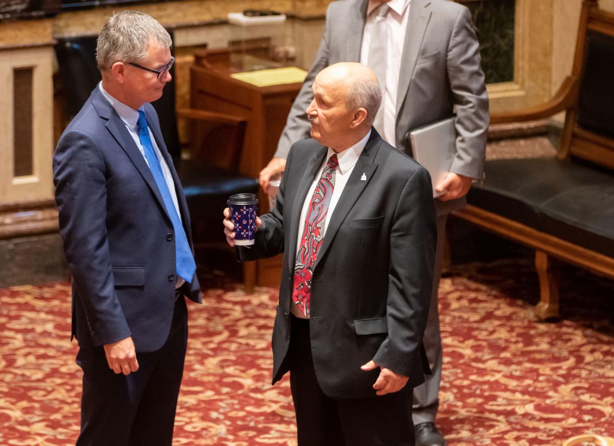 Sen. Eric Giddens, D-Cedar Falls, and Sen. Bill Dotzler, D-Waterloo, speak at the Iowa State Capitol in Des Moines, Tuesday, May 24, 2022.