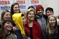 Democratic presidential candidate Sen. Elizabeth Warren, D-Mass., poses for a photo with attendees after speaking at a campaign event, Saturday, Jan. 18, 2020, in Des Moines, Iowa. (AP Photo/Patrick Semansky)