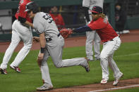 New York Yankees' Luke Voit (59) is tagged out by Cleveland Indians' Jose Ramirez during the fifth inning of Game 2 of an American League wild-card baseball series, Wednesday, Sept. 30, 2020, in Cleveland. (AP Photo/David Dermer)