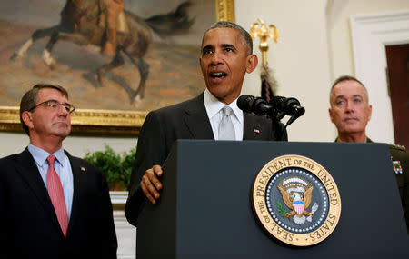 U.S. President Barack Obama, surrounded by U.S. Secretary of Defense Ash Carter (L) and the Chairman of the Joint Chiefs of Staff USMC General Joseph Dunford, Jr., (R) delivers a statement from the Roosevelt Room on Afghanistan at the White House in Washington U.S. July 6, 2016. JREUTERS/Gary Cameron