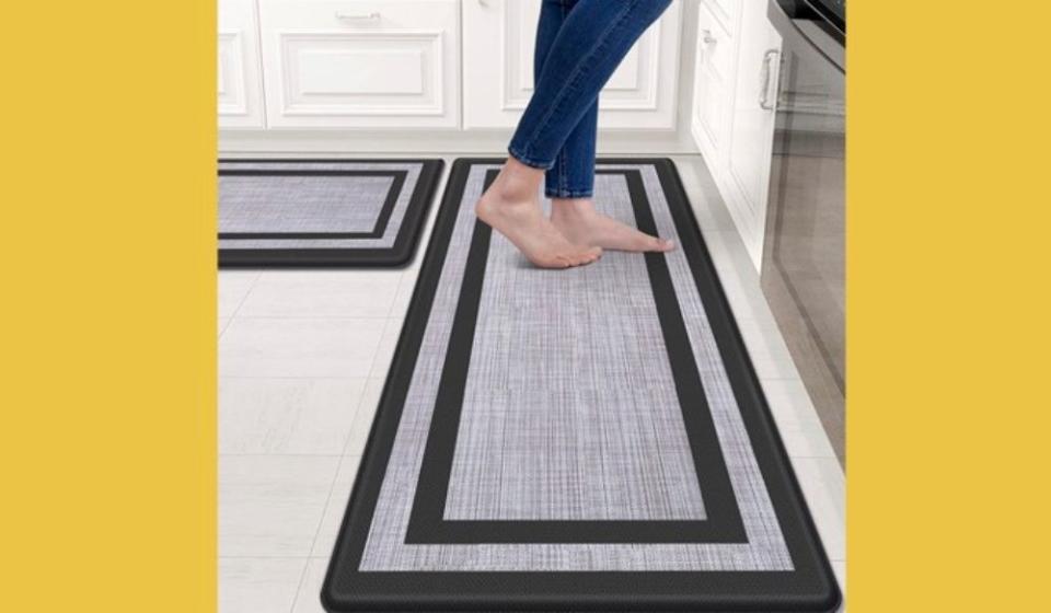 feet on kitchen mat