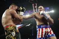 Tyson Fury, of England, hits Tom Schwarz, of Germany, during a heavyweight boxing match Saturday, June 15, 2019, in Las Vegas. (AP Photo/John Locher)