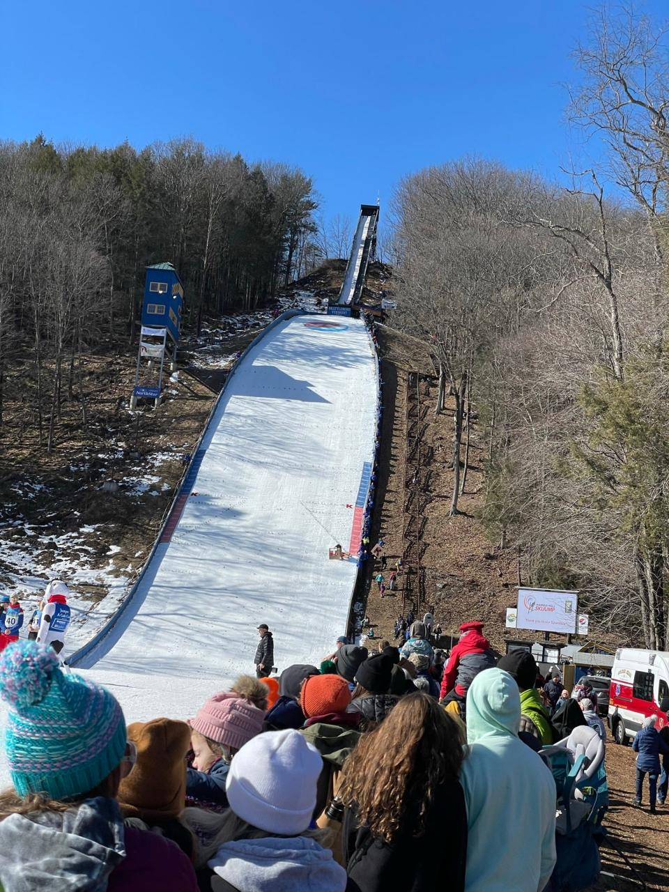 Fans watch the annual weekend Nordic ski jumping event at Brattleboro, Vermont's Harris Hill.